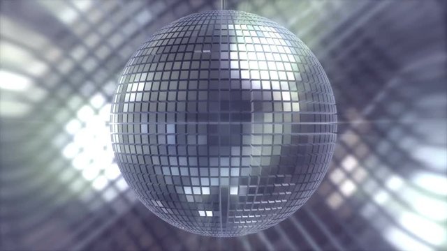 Rotating and glowing disco ball in silver color