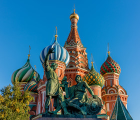 Saint Basils cathedral  on Red Square in Moscow. Famous russian landmarks on blue sky background.