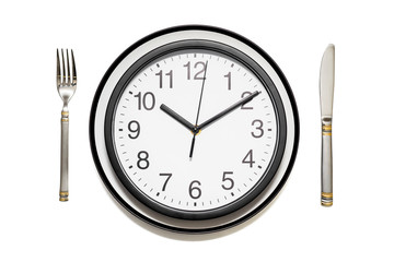 Clock dinner plate with a fork and knife on white background. Clock on plate and knife and fork on white background, top view. Lunch time concept
