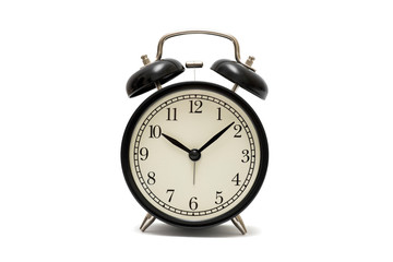 Classic black table clock isolated on a white background. Black retro alarm clock isolated on white background