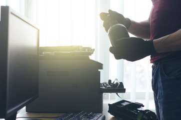 Laser cartridge toner refill or repair concept. Office equipment maintenance concept.