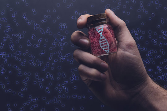 Close up of man holding DNA molecule in Glass bottle. Mixed media.