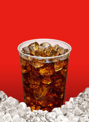 Cola with ice in plastic take away cup isolated on red background