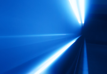 Diagonal motion blur neon blue light ray background