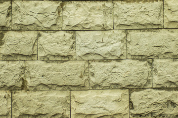 Vintage brick wall. Empty background of brickwork. Sturdy brickwork textured rough surface.