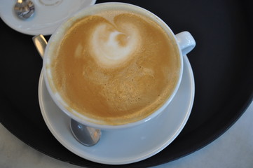 White cup of hot cappuccino