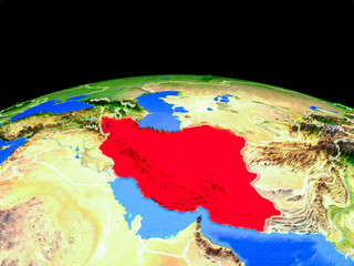 Iran on model of planet Earth with country borders and very detailed planet surface.