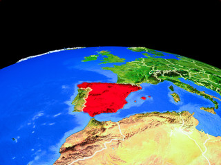 Spain on model of planet Earth with country borders and very detailed planet surface.