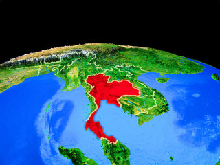 Thailand on model of planet Earth with country borders and very detailed planet surface.