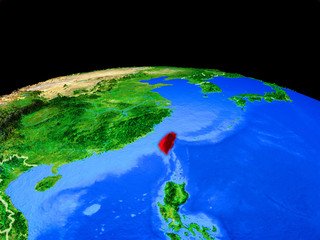 Taiwan on model of planet Earth with country borders and very detailed planet surface.