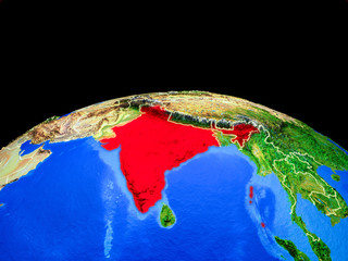 India on model of planet Earth with country borders and very detailed planet surface.