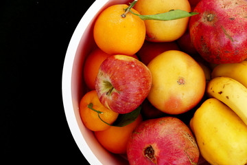 fruit berries in winter berries, apple, orange, mandarin, banana, pomegranate, quince
