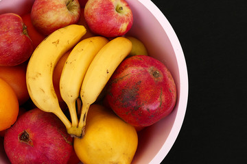 Fototapeta na wymiar fruit berries in winter berries, apple, orange, mandarin, banana, pomegranate, quince