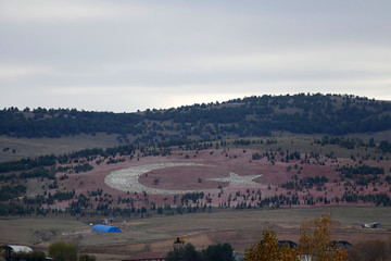 Obraz premium very big turkish flag made on hill,