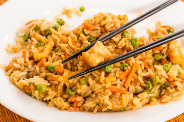 Eating Chicken Fried Rice with Chopsticks