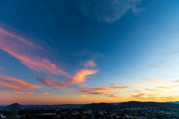 Pink Clouds at Sunset above Horizon