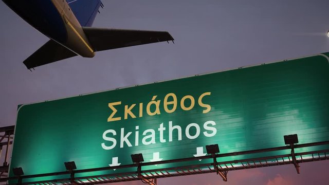 Airplane Take off Skiathos Island during a wonderful sunrise