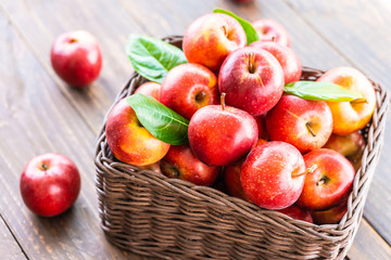 Red apple in basket
