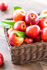 Red apple in basket