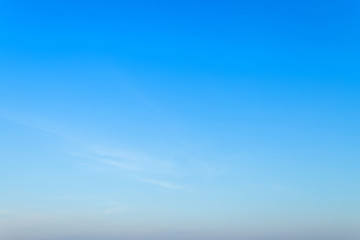 empty blue sky background texture with white clouds.