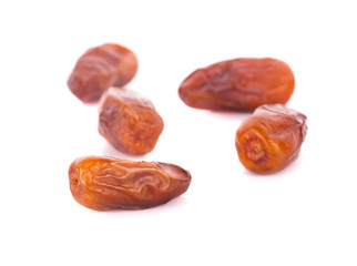 dried fruits from date palm isolated on white background