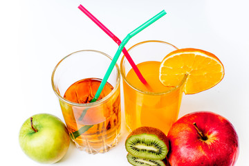 different fruit and juice or smoothie in a glass