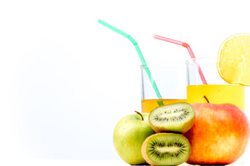 different fruit and juice or smoothie in a glass