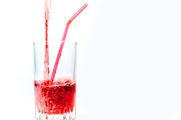 different fruit and juice or smoothie in a glass