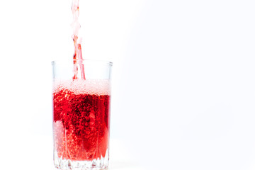 different fruit and juice or smoothie in a glass