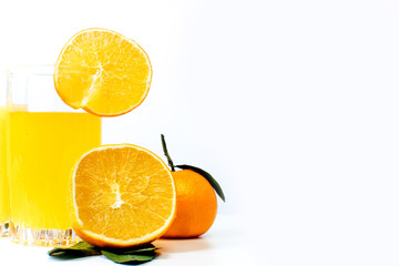 different fruit and juice or smoothie in a glass