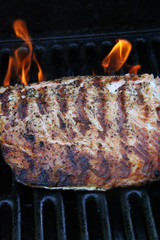 grilled salmon steak fillet with flame