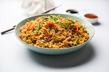 Schezwan veg noodles is a spicy and tasty stir fried flat Hakka noodles with sauce and veggies....