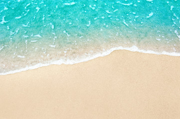 beautiful sandy beach and soft blue ocean wave - obrazy, fototapety, plakaty