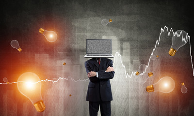 Businessman with laptop instead of head.