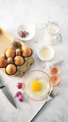 Fresh yolk egg in a glass bowl