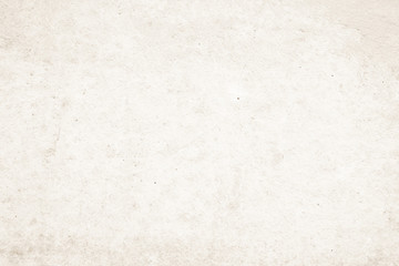 Art concrete or stone texture for background in black, brown and cream colors. Cement and sand wall of tone vintage.