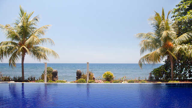 Swimming pool by the sea to relax.