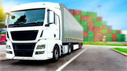 Truck on the road . Commercial transport .  truck transport container