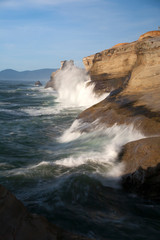 waves crashing on rocks
