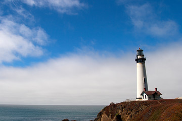 lighthouse and cloud