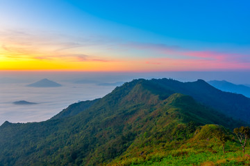 Fototapeta na wymiar Beautiful Landscape of sunrise on Mountain at of Phu Chi Fa ,Thailand