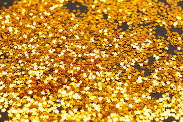 Star shaped confetti on black