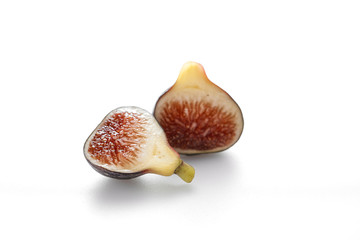 Fig fruits with leaves on white