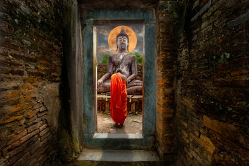 Asia novice monk worship the Buddha with faith.Buddhist monk sacred Buddha statue depicting a religious faith in a temple in country Southeast Asia. - Image - obrazy, fototapety, plakaty