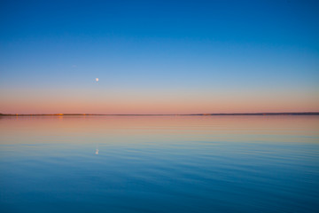 The turquoise lake at dawn.