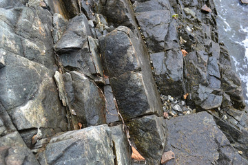 sea stones, rocks, texture of large layered rocks