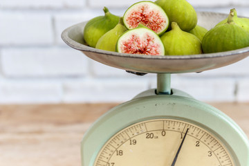 Antique kitchen scale and ripe figs