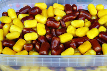 candies in yellow and brown glaze