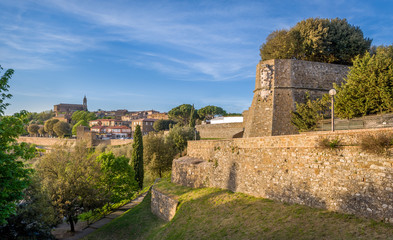 Fototapeta na wymiar Montalcino fortress walls and old town view