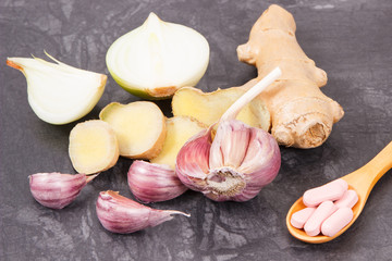 Pills or tablets and fresh healthy natural food, natural treatment of diseases concept